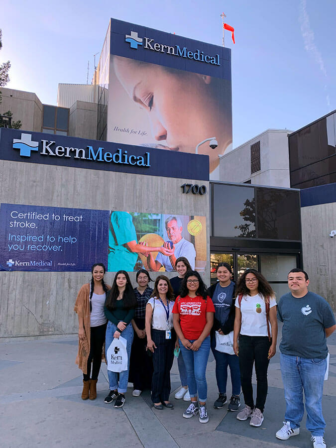 group of people in front of Kern Medical